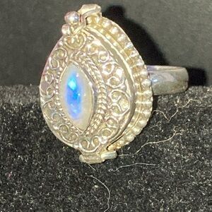 Sterling silver and moonstone “poison” ring.​​